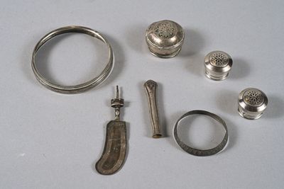 a lot of silver items that are on a table