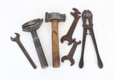 five different types of tools on a white surface