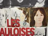 poster of a group of people with faces on them on a wall