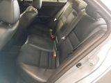 the back seats of a car are empty and the passenger seat is empty