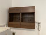 a picture of a desk and a cabinet in a room