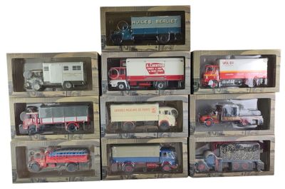 de nombreux types de camions jouets dans une vitrine