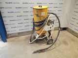 a machine that is sitting on the floor in a room