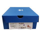 a blue box that has a pair of shoes in it