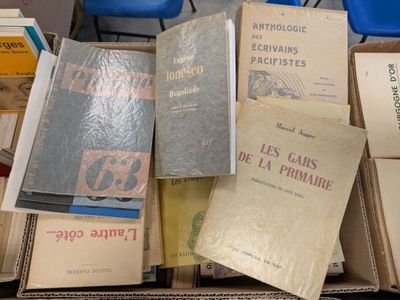 many books that are sitting on a table