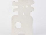 a white sculpture that is sitting on a white surface