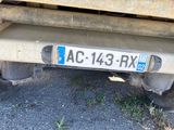 a license plate on the back of a truck