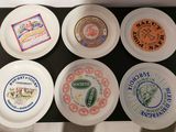 six plates that have different types of beer on them