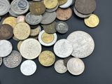 a lot of coins that are on the table