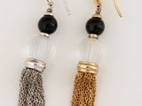 two pairs of tassel earrings with gold chains and black beads