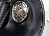 a close up of a car ' s interior with the door open