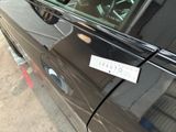 a sticker on the door of a car that says today
