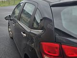 a car that is parked on the side of the road