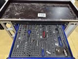 a tool tray with a lot of tools inside of it