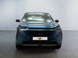 the front view of a blue electric car in a white room