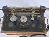 an old fashioned telephone that is sitting on a table