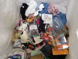 a bag full of clothes and other items in it