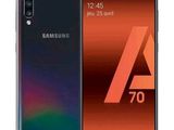 the samsung a70 smartphone is shown with a colorful background