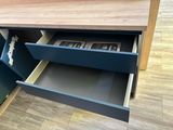 a drawer that has a bunch of items inside of it