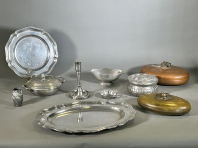 a table with a lot of silver items on it