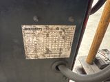 a close up of a metal box with a sticker on it