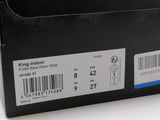 a black box with a white barcode on it