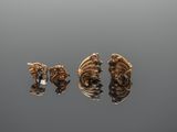 trois paires de boucles d'oreilles en or et diamants posées sur une surface grise