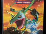 pokemon trading card game box on a black background with a red sky in the background