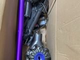 a box with a bunch of vacuums inside of it