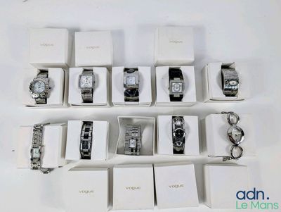 a lot of watches that are sitting in a box
