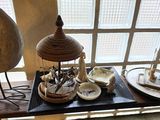a table with a bird and a tray with food on it