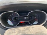 a close up of a car dashboard with a speedometer