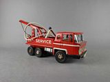 a toy fire truck with a hose attached to it