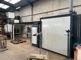 an image of a factory with a lot of equipment