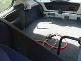 a picture of the inside of a car with the door open