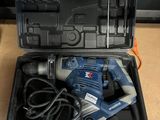 a tool in a case that is sitting on a table