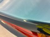 a close up of a car ' s tail light and taillights