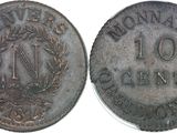 a close up of a coin with a wreath on it