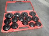 a red case with a bunch of black wheels in it