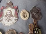 a lot of medals that are on the table