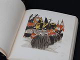 an open book with a drawing of a group of people
