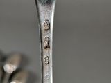 a spoon that has some kind of writing on it