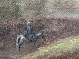 a painting of a man riding a horse on a hill
