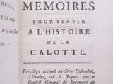 an open book with a picture of a castle on it