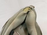 a close up of a bag with a tag on it