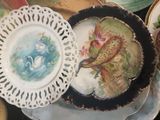 a lot of plates that are sitting on a table