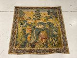 an image of a tapestry hanging on a wall in a room