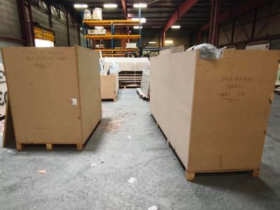 many boxes that are sitting in a warehouse
