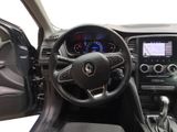 a picture of the interior of a car with a steering wheel and dashboard