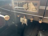 a dashboard of a car with a clock on it